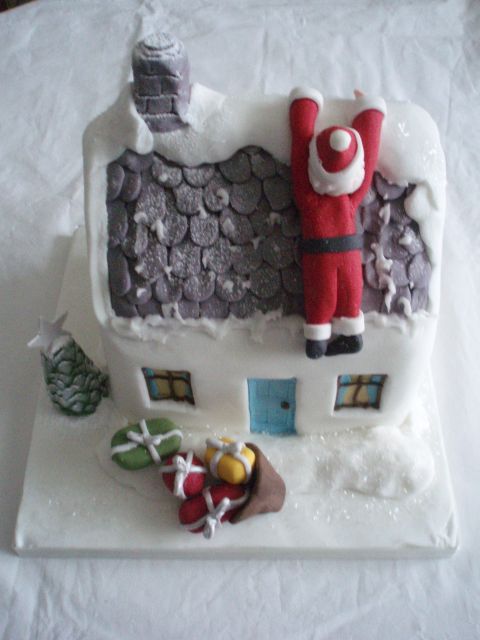 Santa slips on Roof