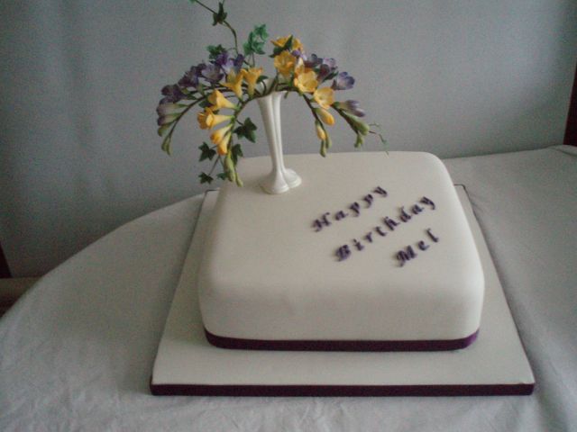 Vase of Freesias and Ivy